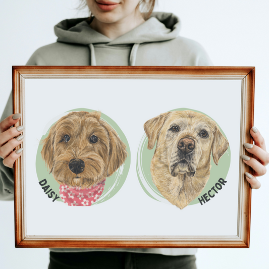 Person holding a framed portrait of two dogs named Daisy and Hector.